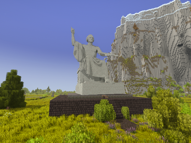 Large voxel sculpture of George Washington beside a cliff